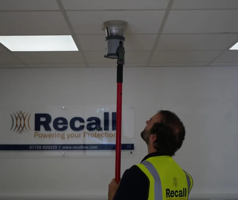 Emergency lighting compliance report documenting inspection results and recommendations