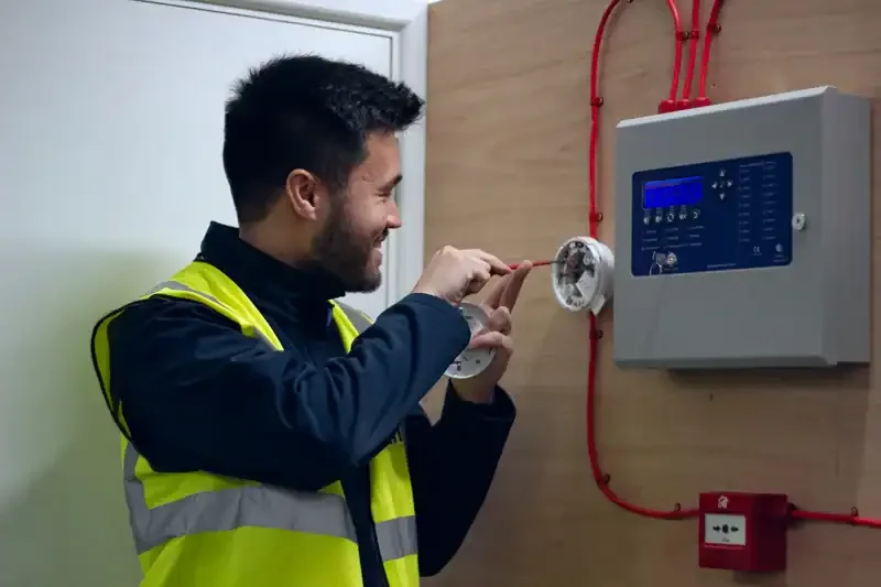 Recall SW engineer conducting fire alarm system practice and testing
