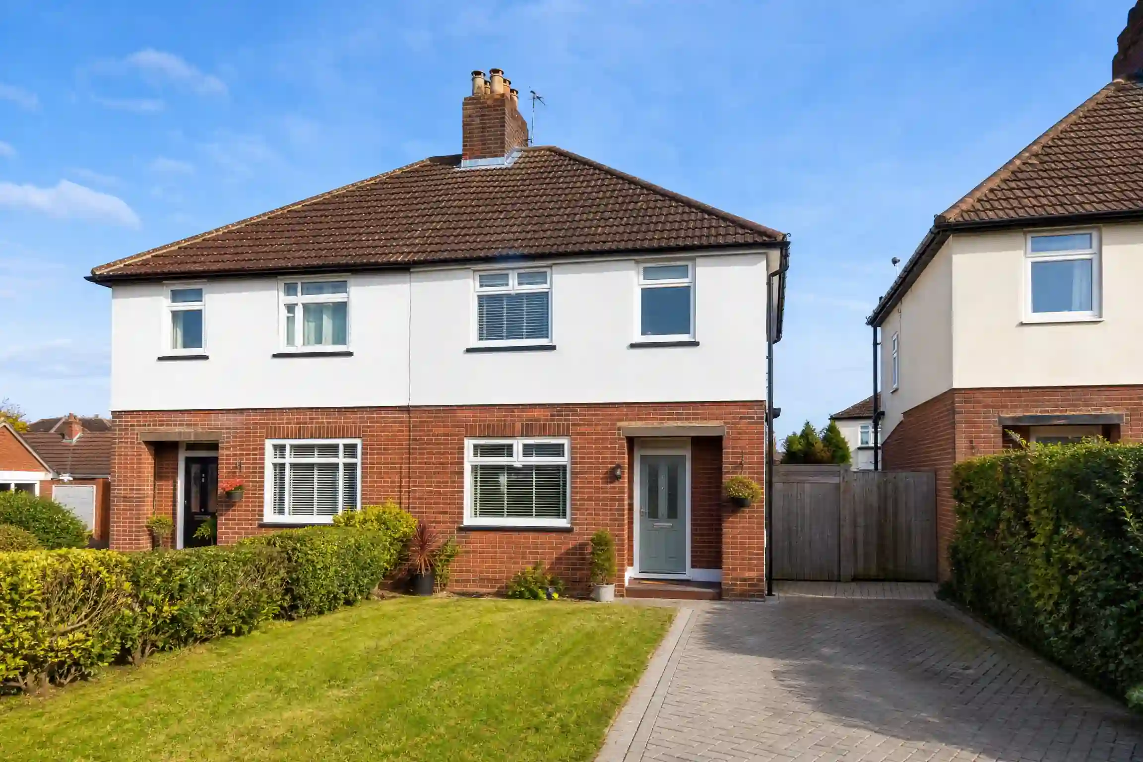 UK semi-detached residential property exterior - landlord fire and security compliance